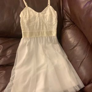 An extra small cream and white dress.